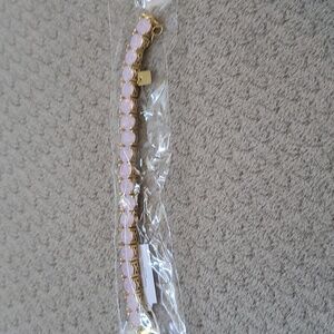 Bracelet by Park Lane. Pink stones with gold clasps